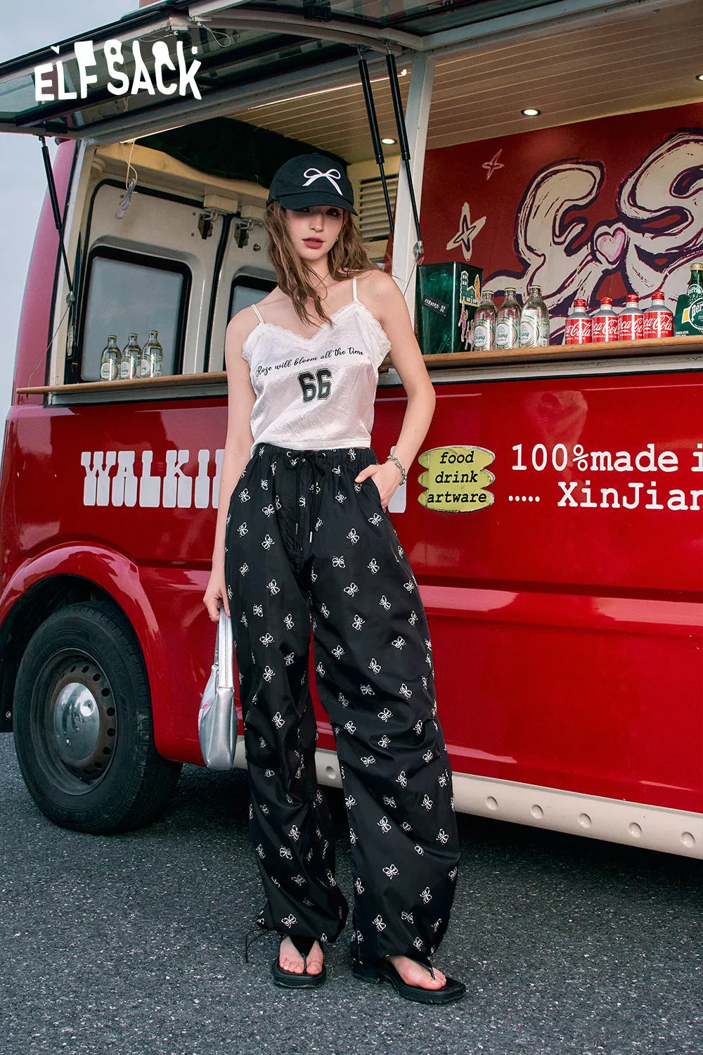 ELFSACK 2024 Summer New Arrivals Bow print black straight leg casual pants for women, thin pants