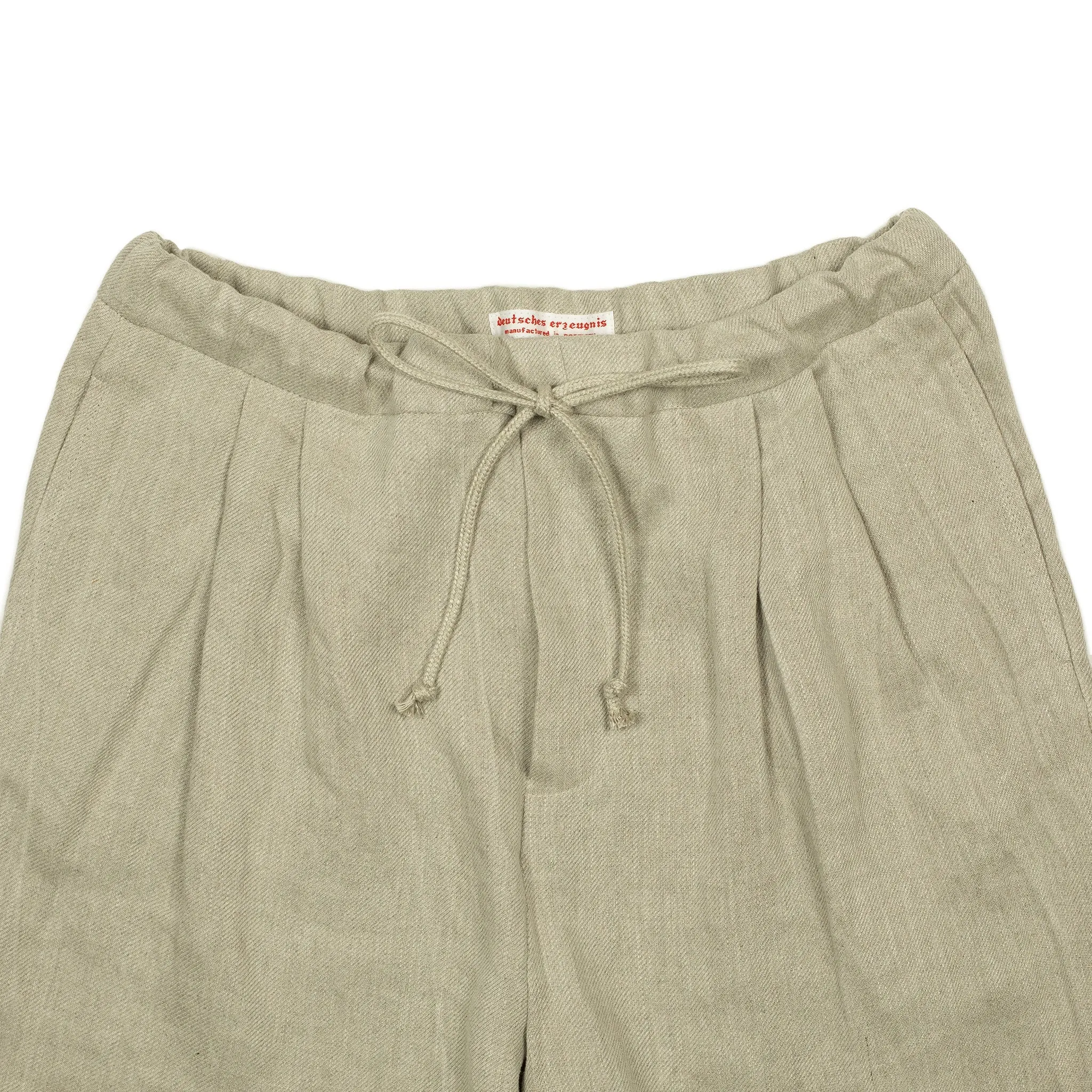 Pleated drawstring trousers in soft oatmeal washed linen twill