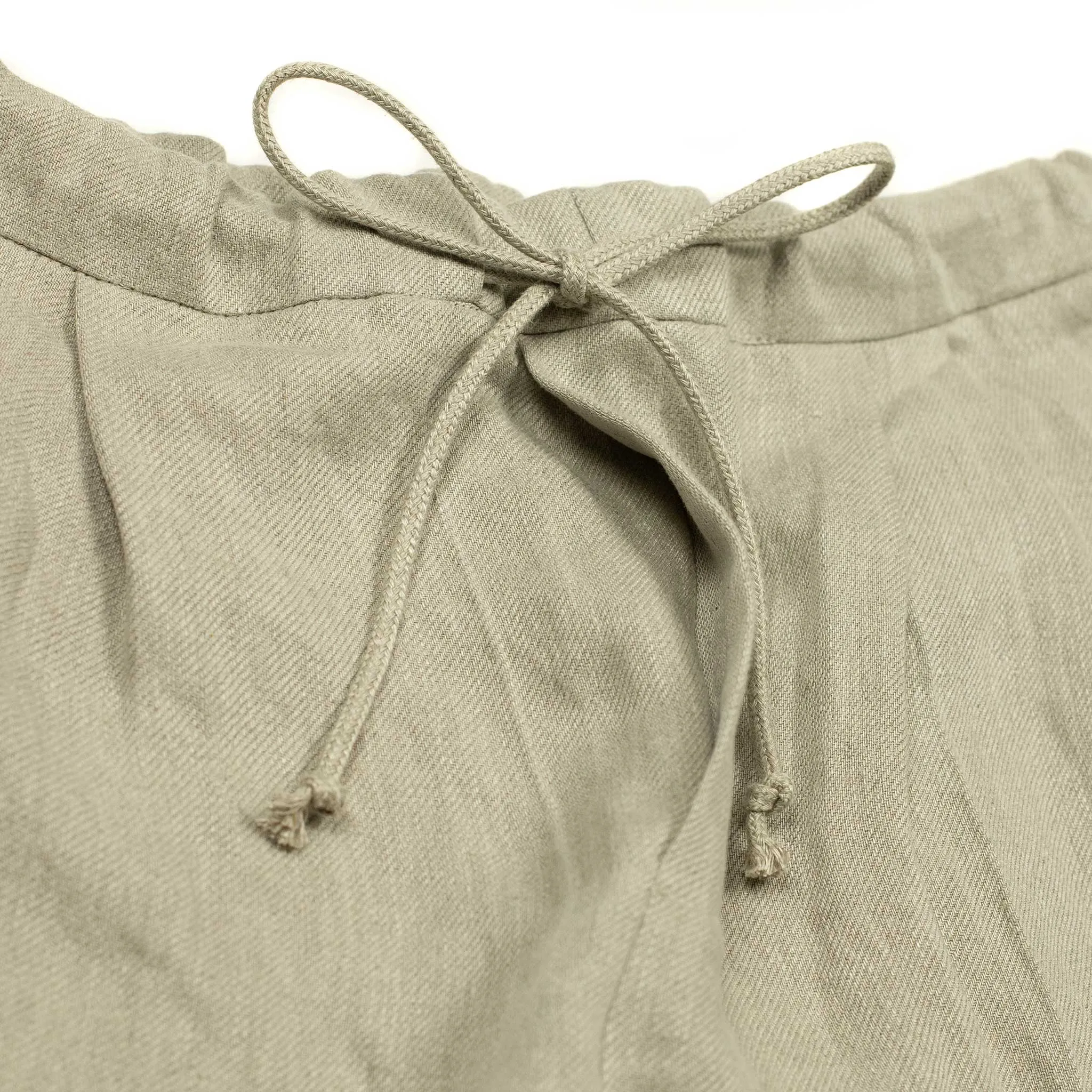 Pleated drawstring trousers in soft oatmeal washed linen twill