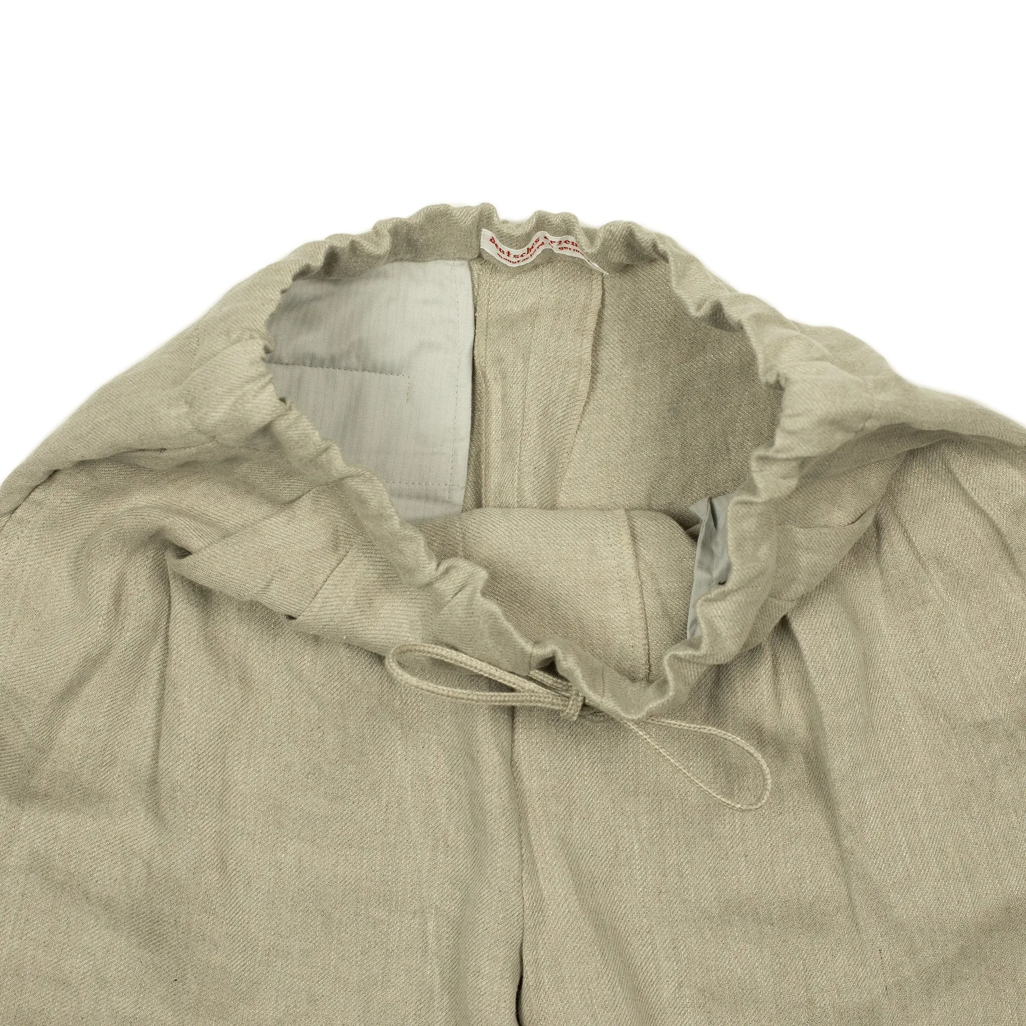 Pleated drawstring trousers in soft oatmeal washed linen twill